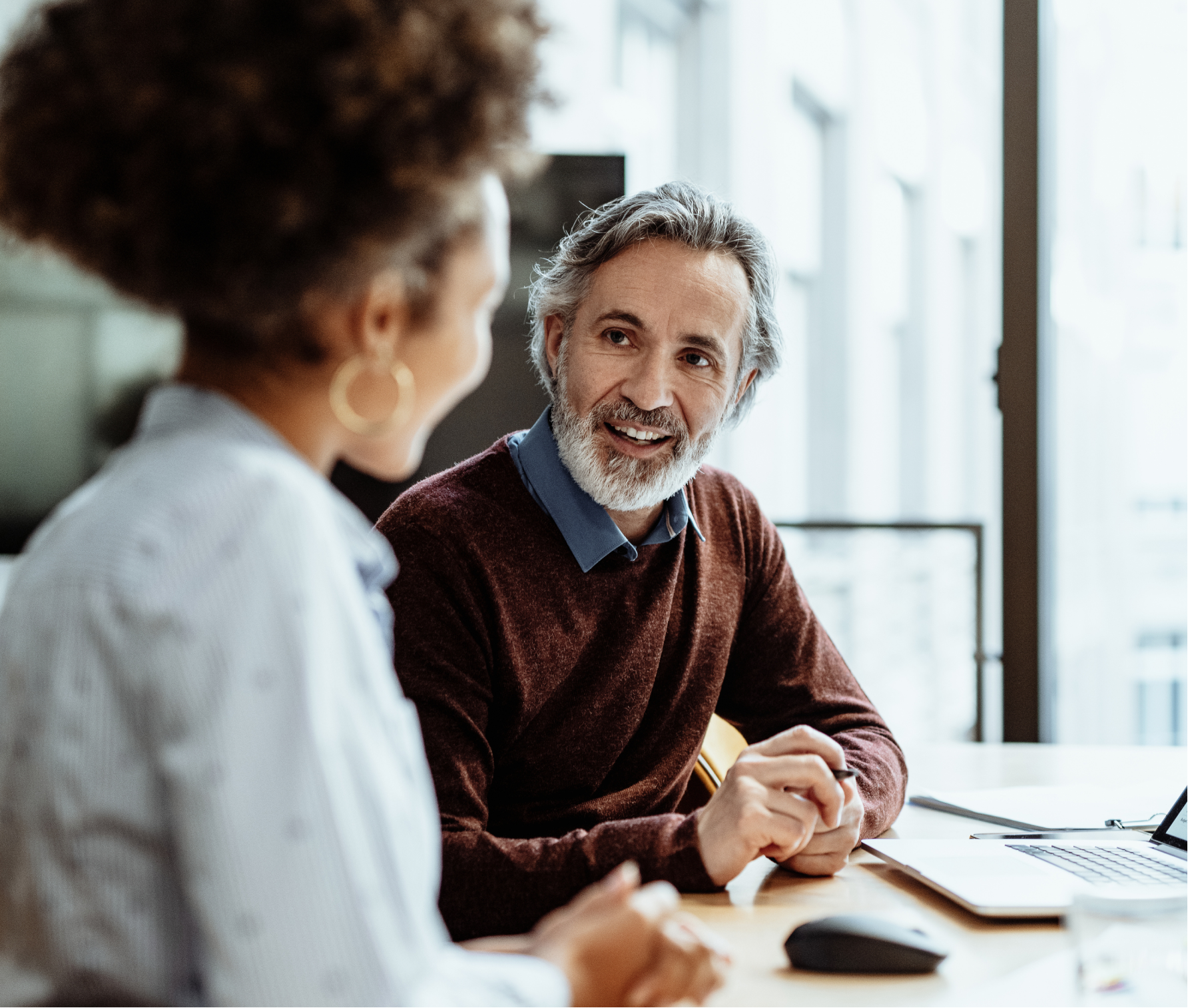 An advisor meeting with a client